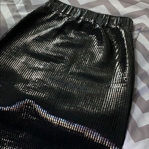 Shiny fun St. John’s black mini skirt